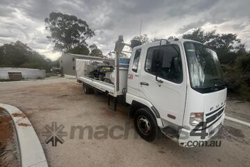 Mitsubishi Kerb Machine and Fuso Truck