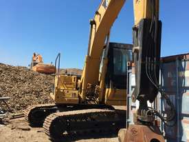 Cat 325C excavator with Randalls log grapple - picture1' - Click to enlarge