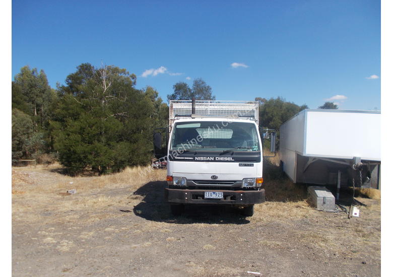 caption Nissan Tipper Truck