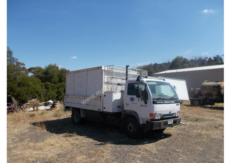 caption Nissan Tipper Truck