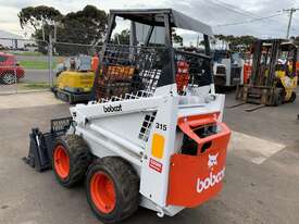 BOBCAT 315 with 4 in 1 bucket - picture2' - Click to enlarge