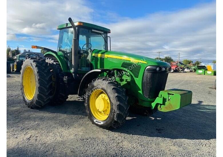 caption 2002 John Deere 8320 Row Crop Tractors