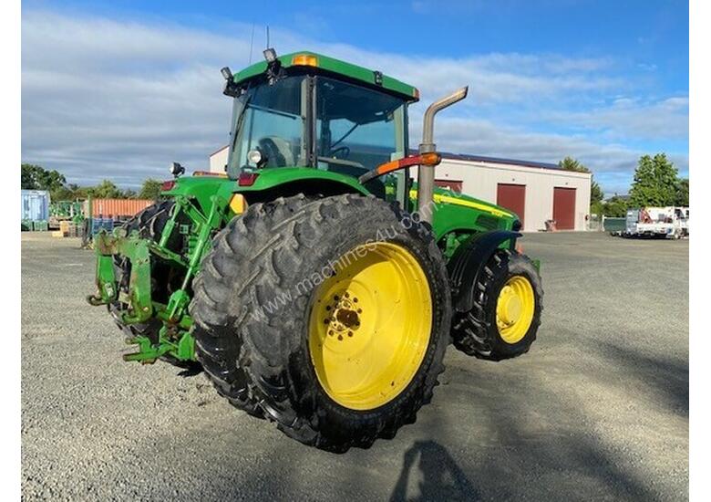 caption 2002 John Deere 8320 Row Crop Tractors