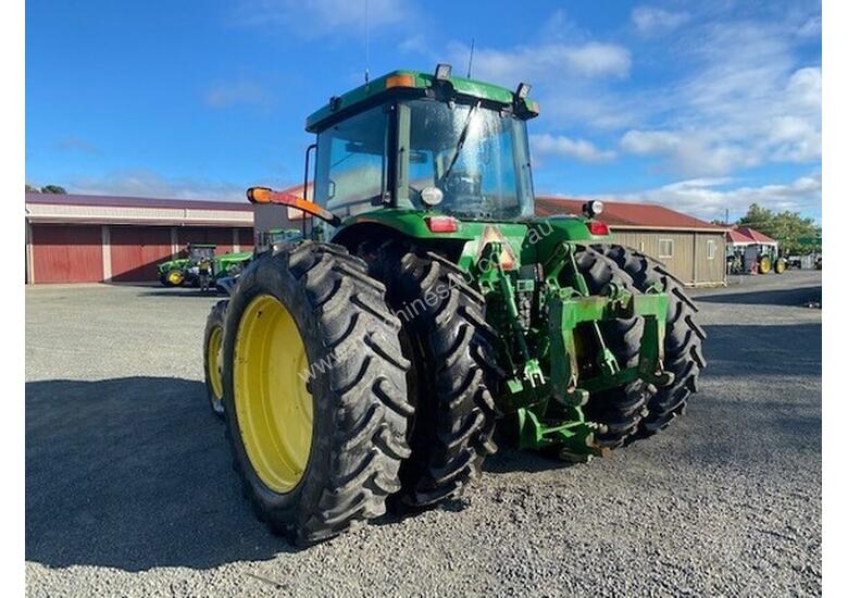caption 2002 John Deere 8320 Row Crop Tractors
