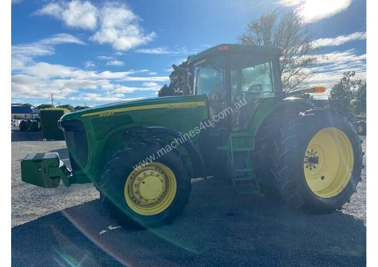 caption 2002 John Deere 8320 Row Crop Tractors
