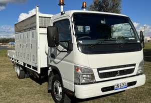 Mitsubishi Fuso Canter 4.0 4x2 Traytop Service Body Truck with Palfinger Crane. Ex Govt