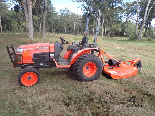 caption Kubota tractor with slasher