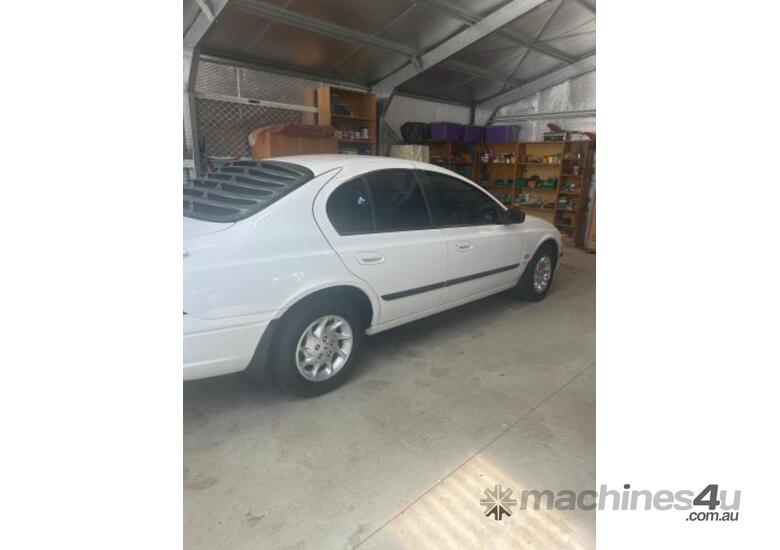 caption 1998 Ford Falcon Forte