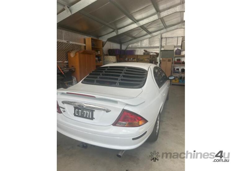 caption 1998 Ford Falcon Forte