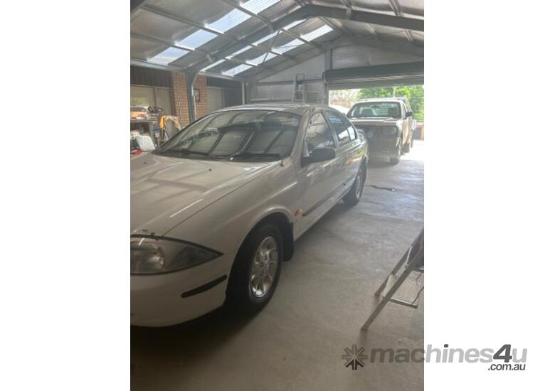 caption 1998 Ford Falcon Forte