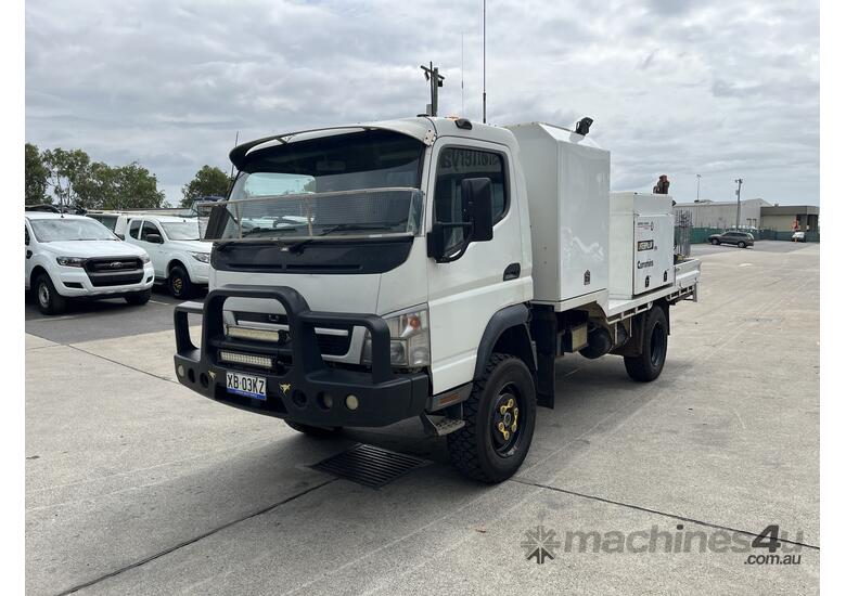 caption 2009 Mitsubishi Canter 4x4 Service Truck with Crane