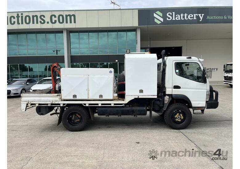 caption 2009 Mitsubishi Canter 4x4 Service Truck with Crane