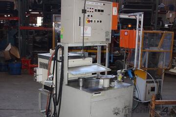 RIVETING STATION WITH VACUUM ASSISTED STUD