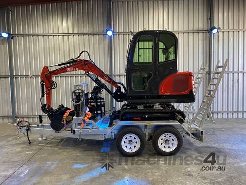 caption 2.7c excavator with enclosed cab, air conditioning and trailer package $56,990+GST
