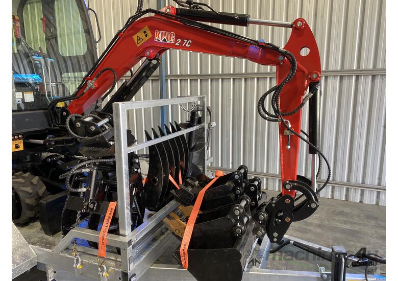 caption 2.7c excavator with enclosed cab, air conditioning and trailer package $56,990+GST