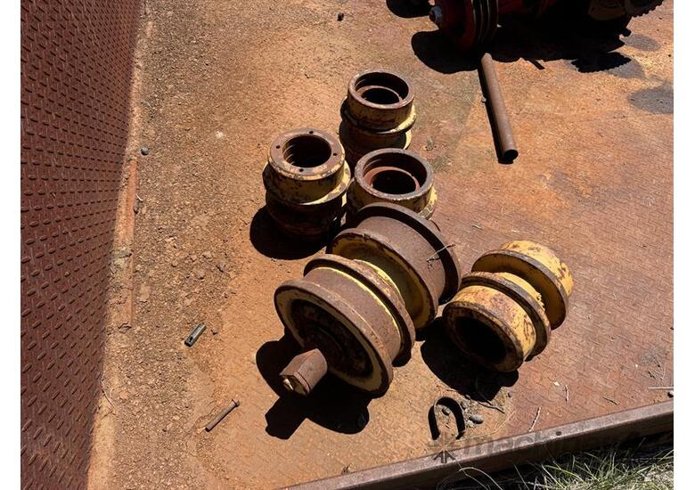 caption KOMATSU DOZER ROLLER PARTS