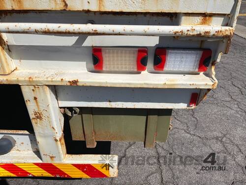 caption 1987 Fruehauf F3ST Tri Axle Flat Top Trailer