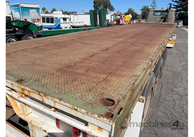 caption 1987 Fruehauf F3ST Tri Axle Flat Top Trailer
