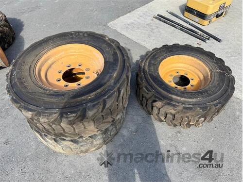 caption QTY X 3 SKID STEER TYRES