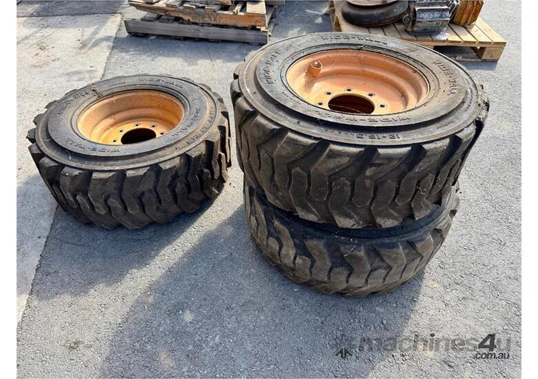 caption QTY X 3 SKID STEER TYRES