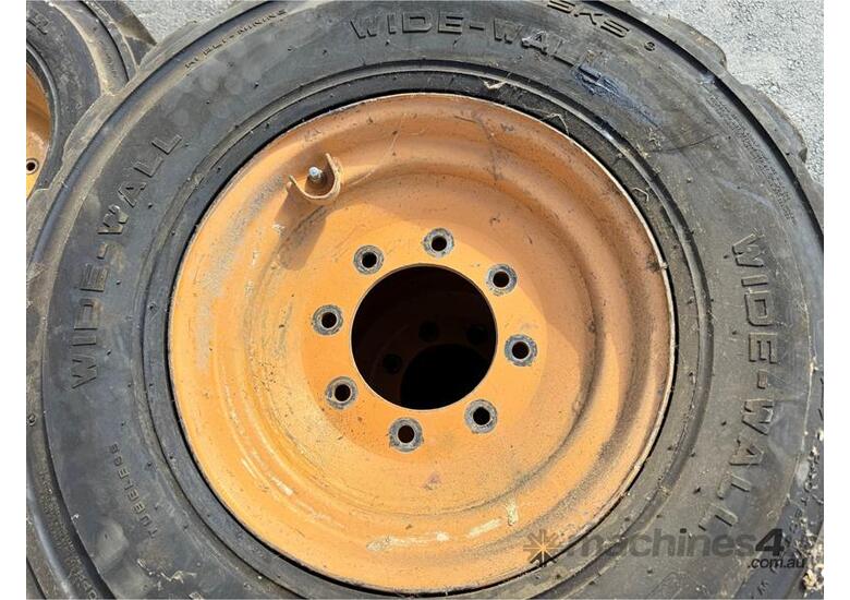 caption QTY X 3 SKID STEER TYRES