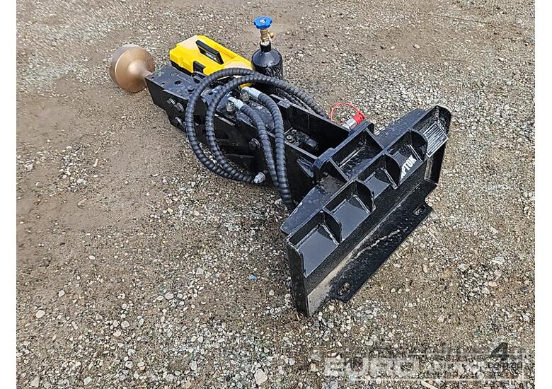 caption Unused Captok Post Driver to suit Mini Skidsteer Loader