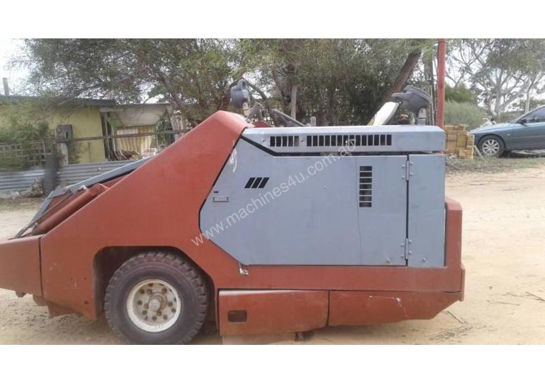 caption POWERBOSS ride on sweeper complete & operational