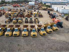 Choice of 9 Caterpillar 730C2 & EJ Dump Trucks - picture0' - Click to enlarge