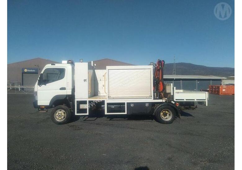 caption Mitsubishi Fuso Canter 7/800