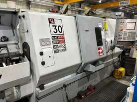 Haas SL30 + Bar Feeder - picture0' - Click to enlarge