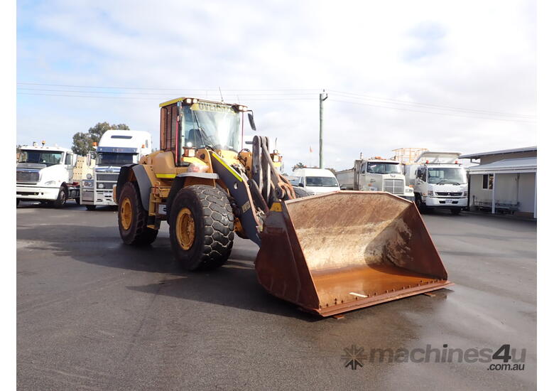 caption 2012 Volvo L120F Wheel Loader Tool Carrier + GP Bucket, Forks, Quick Hitch,