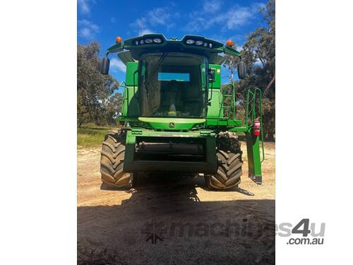 caption 2012 John Deere S670 Combines