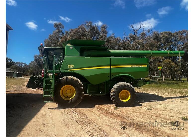 caption 2012 John Deere S670 Combines