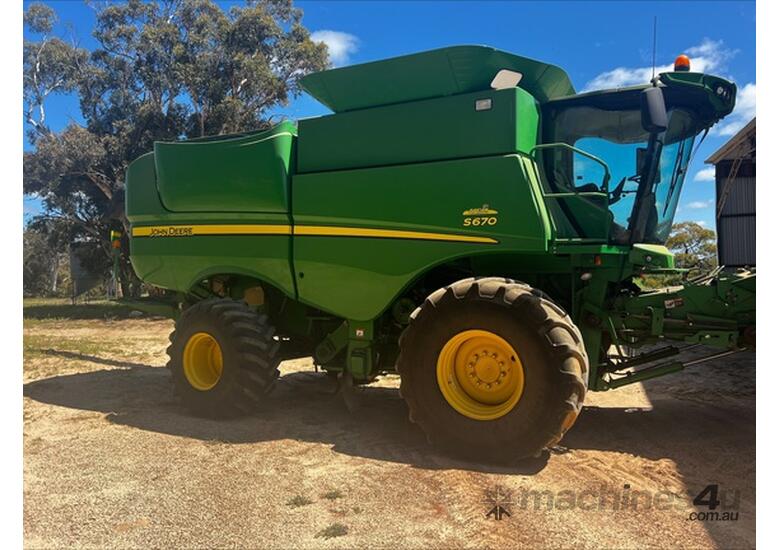 caption 2012 John Deere S670 Combines
