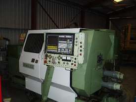 Okuma LC20 CNC lathe with Bar Feeder - picture0' - Click to enlarge