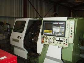 Okuma LC20 CNC lathe with Bar Feeder - picture2' - Click to enlarge