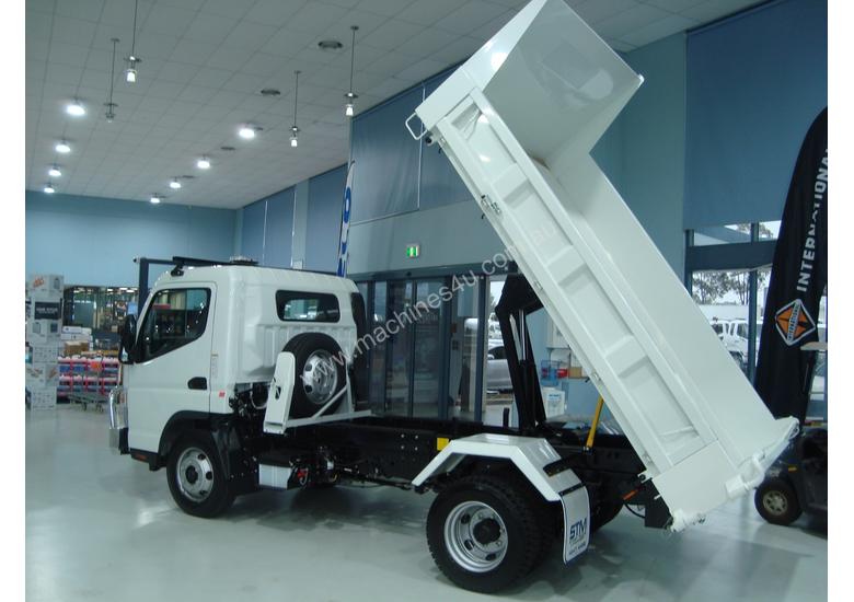 caption Fuso Canter 815 Tipper Truck