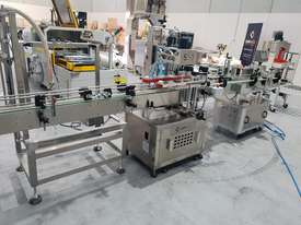 Bottling filling/capping/labelling line - picture0' - Click to enlarge