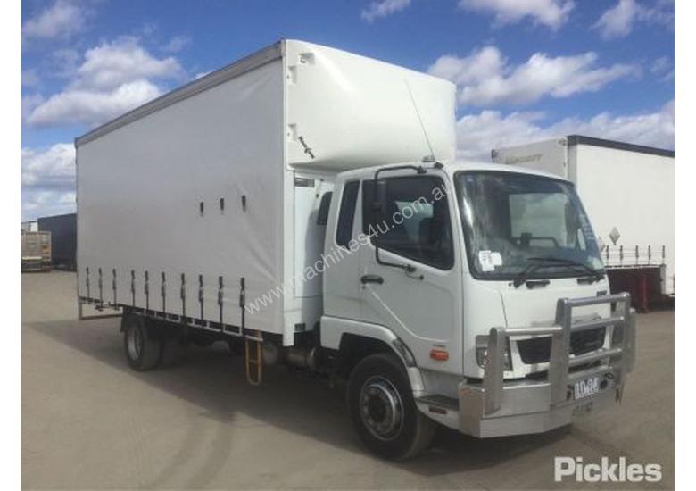 caption 2013 Mitsubishi Fighter FK600