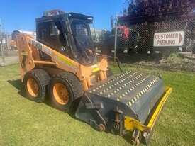 Skid Steer Mustang 2044 2002 with Road Broom - picture0' - Click to enlarge