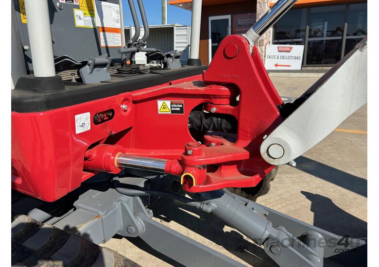 caption Takeuchi TB216 Excavator