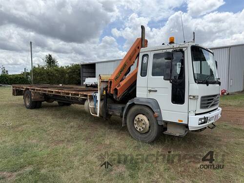caption 2003 VOLVO FL6E CRANE TRUCK