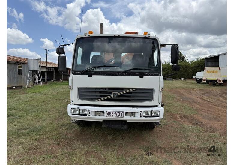 caption 2003 VOLVO FL6E CRANE TRUCK