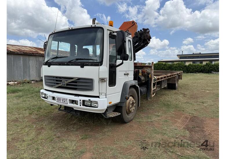 caption 2003 VOLVO FL6E CRANE TRUCK