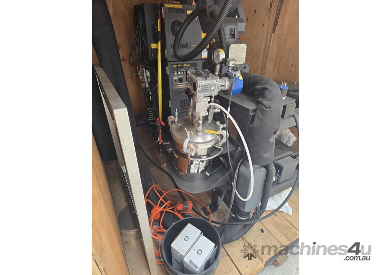 caption CERAKOTE PaintMate Robotic Arm
