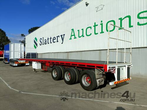 1992 Barker Heavy Duty Tri-Axle Flatbed Trailer