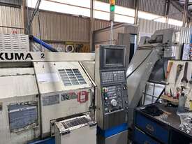 CNC Lathe Okuma LCS - 15 with Bartec Rapidfeed Auto Barloader, Part Catcher, Swarf Conveyor - picture1' - Click to enlarge