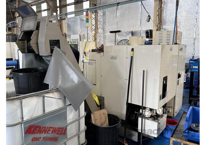 Used 2007 Okuma CNC Lathe Okuma LCS 15 with Bartec Rapidfeed Auto