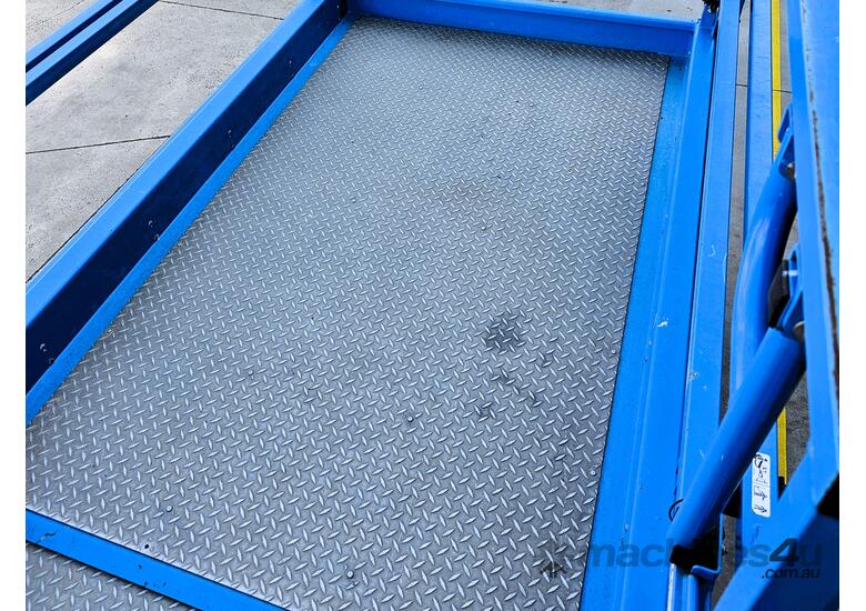 caption 2021 Genie GS-2669 RT 26ft Rough Terrain, Self Levelling Diesel Scissor Lift