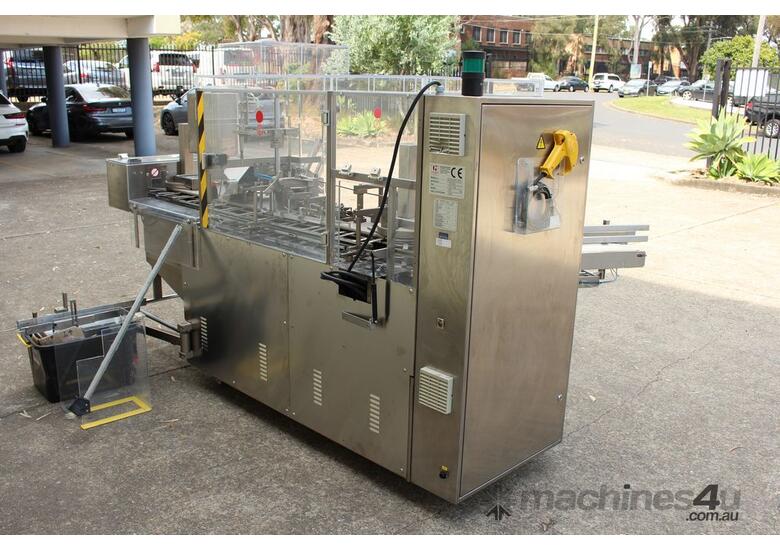 caption Automatic Intermittent Motion Vertical Cartoning Machine.